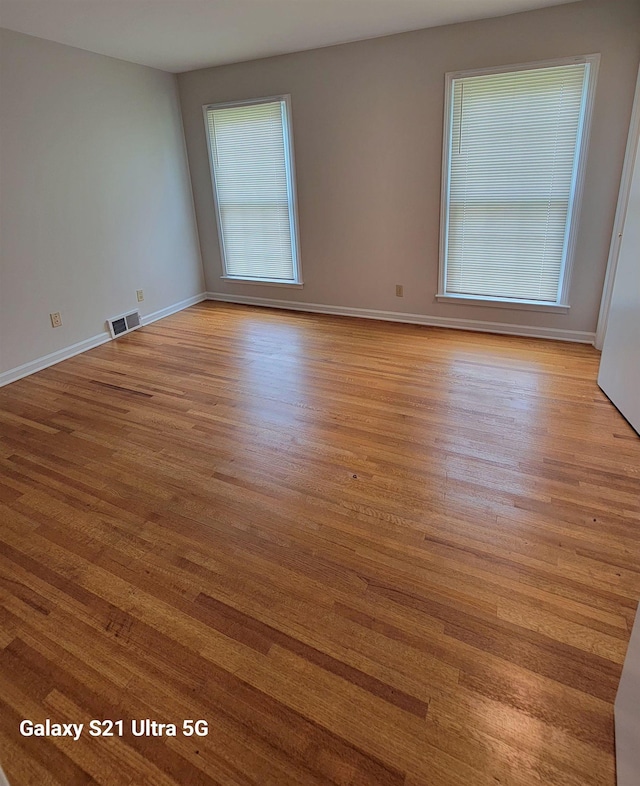 5551 Derron Dr, Memphis, TN 38115 - unfurnished room featuring baseboards and wood finished floors