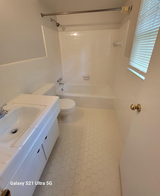 5551 Derron Dr, Memphis, TN 38115 - full bath featuring tile walls, toilet, shower / bath combination, and vanity