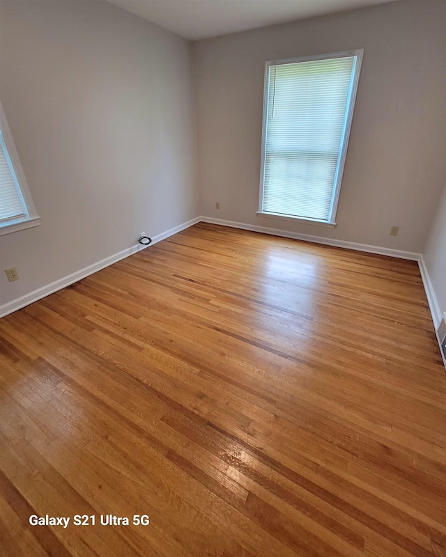 5551 Derron Dr, Memphis, TN 38115 - empty room featuring wood finished floors and baseboards