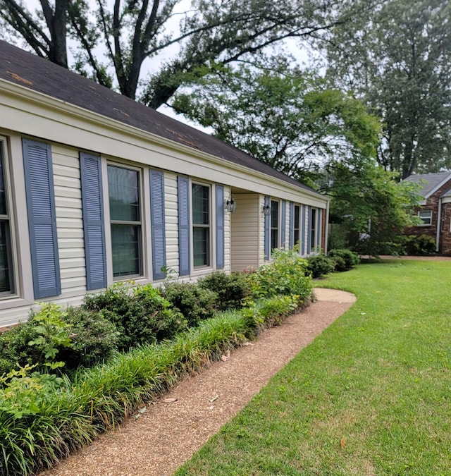 5551 Derron Dr, Memphis, TN 38115 - view of property exterior featuring a lawn