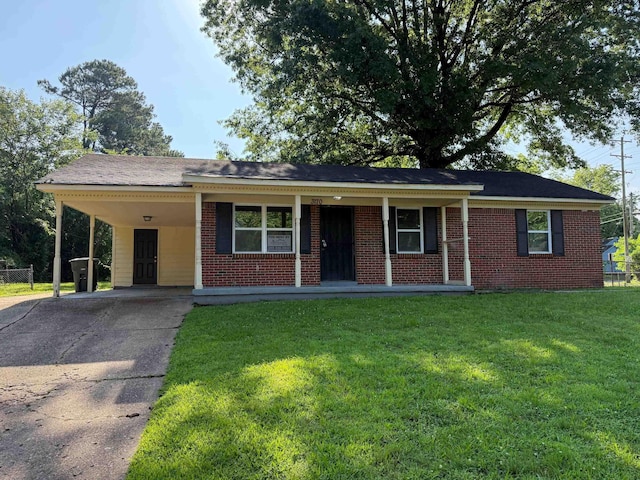 3170 Harvester Ln, Memphis, TN 38127 - ranch-style home with brick siding, driveway, a front lawn, an attached carport, and a porch
