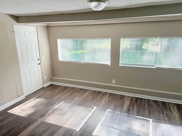 3170 Harvester Ln, Memphis, TN 38127 - spare room featuring wood finished floors and baseboards