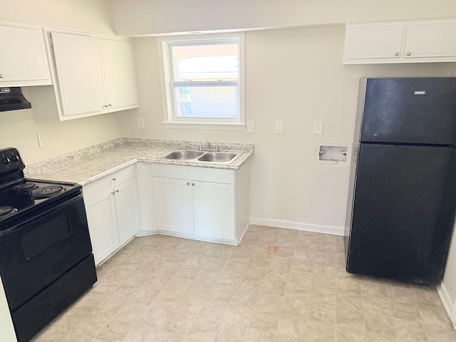 3170 Harvester Ln, Memphis, TN 38127 - kitchen with black appliances, a sink, and white cabinetry