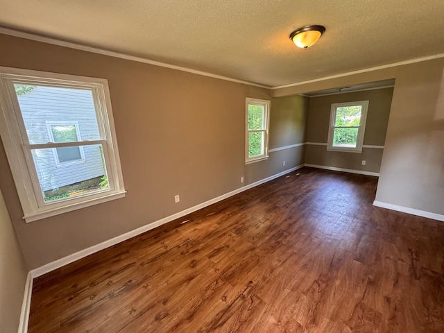 1591 Michael St, Memphis, TN 38111 - unfurnished room with ornamental molding, dark wood-style floors, a textured ceiling, and baseboards