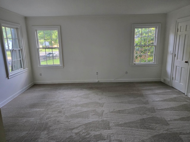 137 Perkins Ext, Memphis, TN 38117 - carpeted empty room featuring baseboards