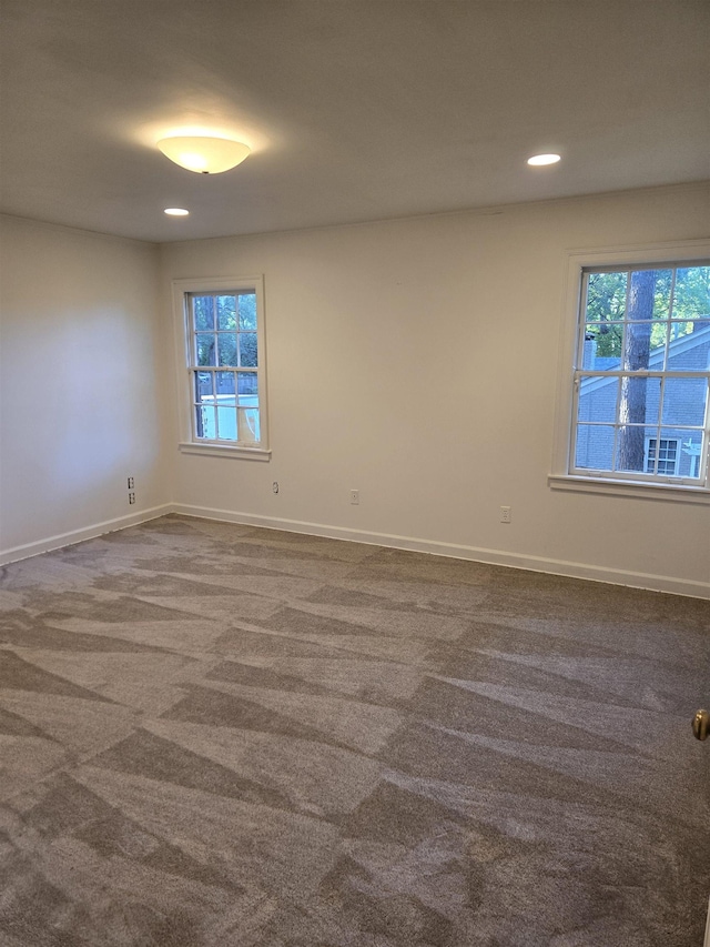 137 Perkins Ext, Memphis, TN 38117 - empty room featuring dark carpet, baseboards, and recessed lighting