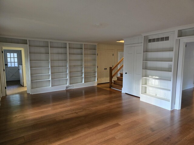 137 Perkins Ext, Memphis, TN 38117 - spare room featuring wood finished floors, stairs, built in features, and ornamental molding