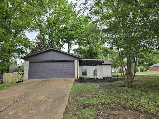 3403 Lynchburg St, Memphis, TN 38134 - ranch-style house featuring brick siding, driveway, and an attached garage
