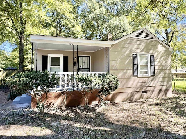 1670 Green Dolphin St, Memphis, TN 38111 - view of front of house with crawl space, covered porch, and a chimney