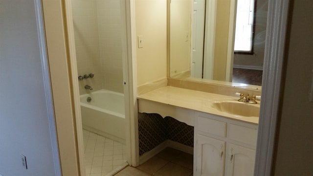 6240 Kirby Downs Dr, Memphis, TN 38115 - bathroom featuring vanity, tile patterned floors, and washtub / shower combination