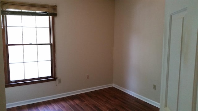 6240 Kirby Downs Dr, Memphis, TN 38115 - unfurnished room with dark wood-style floors and baseboards