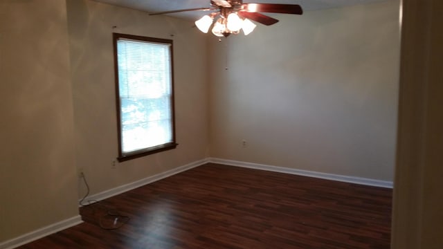 6240 Kirby Downs Dr, Memphis, TN 38115 - unfurnished room with healthy amount of natural light, a ceiling fan, wood finished floors, and baseboards