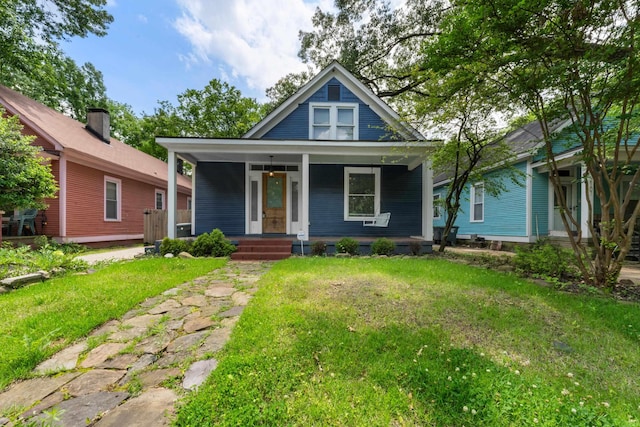 2111 Lee Pl, Memphis, TN 38104 - view of front of house with covered porch and a front lawn