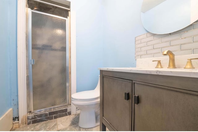 12580 Macon Rd, Tn, TN 38017 - full bathroom featuring vanity, tasteful backsplash, a stall shower, and toilet