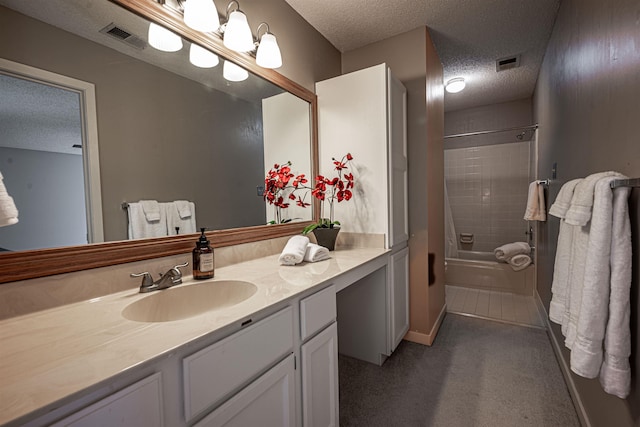 8451 Donegal Cv, Germantown, TN 38139 - full bath with a textured ceiling, vanity, shower / bathtub combination, and baseboards