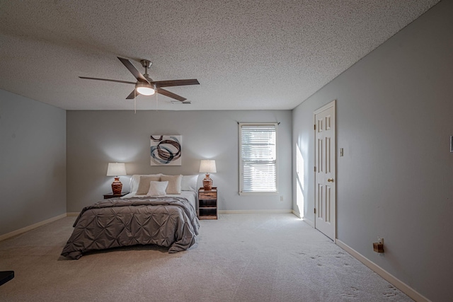 8451 Donegal Cv, Germantown, TN 38139 - bedroom featuring carpet floors, a ceiling fan, baseboards, and a textured ceiling