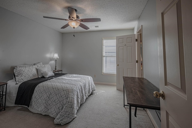 8451 Donegal Cv, Germantown, TN 38139 - bedroom featuring light colored carpet, a textured ceiling, a ceiling fan, and baseboards