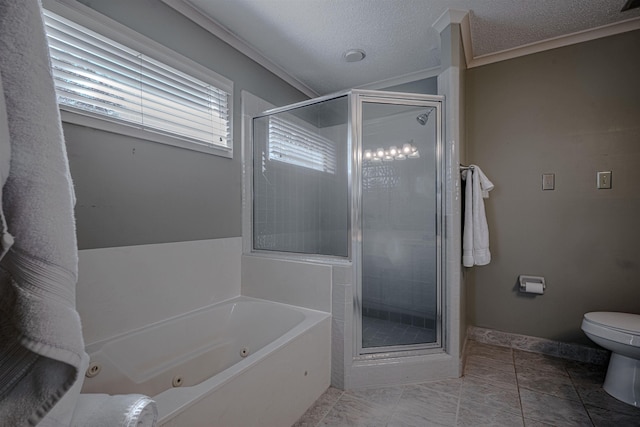 8451 Donegal Cv, Germantown, TN 38139 - bathroom featuring a shower stall, a tub with jets, toilet, a textured ceiling, and crown molding