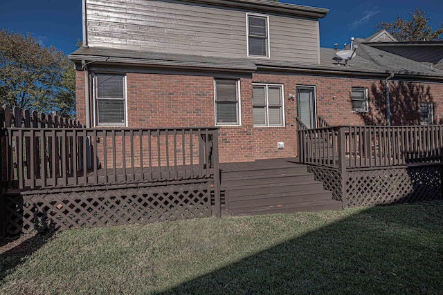 8451 Donegal Cv, Germantown, TN 38139 - rear view of house featuring brick siding, a wooden deck, and a lawn