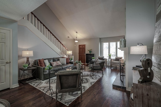 8451 Donegal Cv, Germantown, TN 38139 - living area featuring stairway, wood-type flooring, high vaulted ceiling, and baseboards