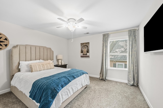 1002 New York St, Memphis, TN 38104 - bedroom featuring carpet floors, baseboards, and a ceiling fan