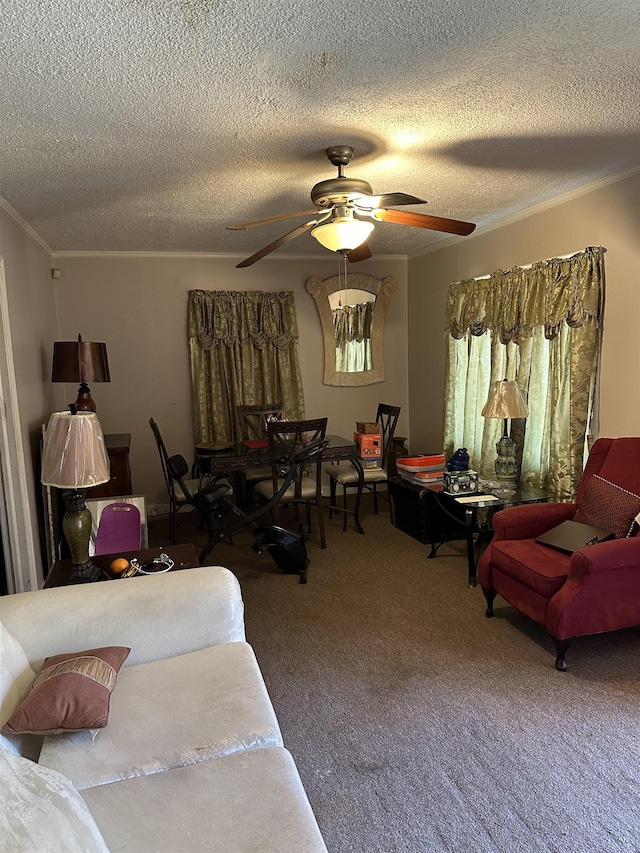 1503 Hope St, Memphis, TN 38111 - carpeted living room with crown molding, a ceiling fan, and a textured ceiling