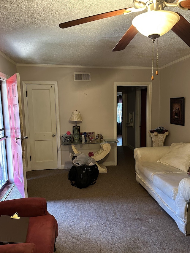 1503 Hope St, Memphis, TN 38111 - living room with ornamental molding, carpet, ceiling fan, and a textured ceiling