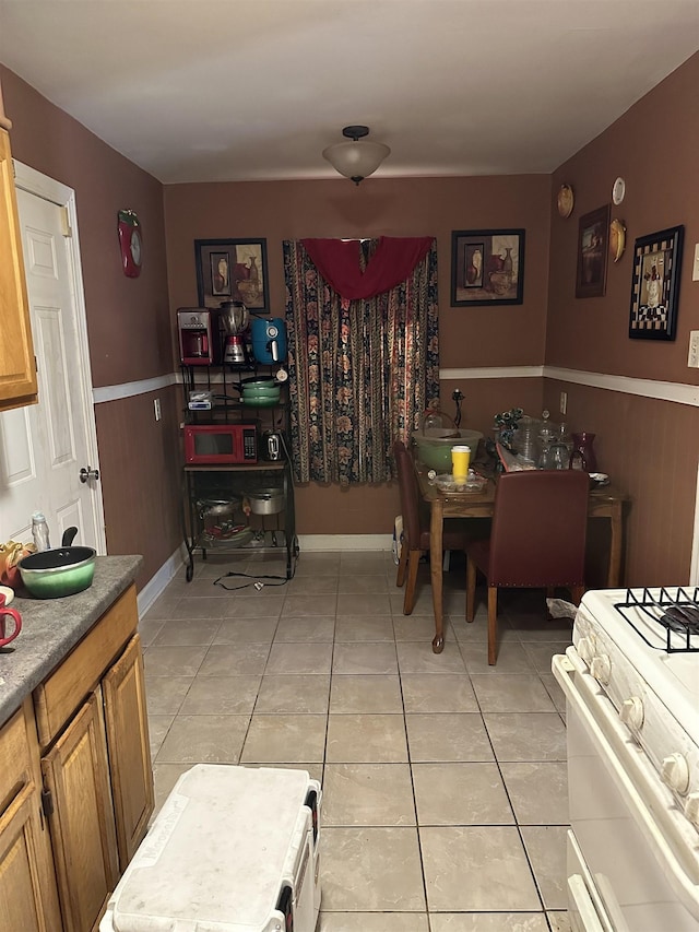 1503 Hope St, Memphis, TN 38111 - dining room featuring wainscoting and light tile patterned floors