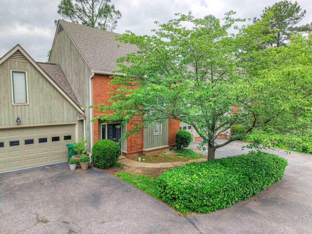 1823 Allenby Green Dr Unit 6, Germantown, TN 38139 - view of front of house featuring roof with shingles, brick siding, driveway, and an attached garage