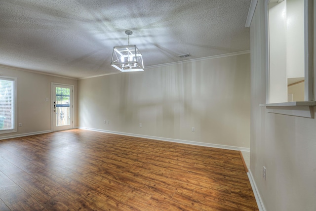 1823 Allenby Green Dr Unit 6, Germantown, TN 38139 - unfurnished room featuring crown molding, a textured ceiling, wood finished floors, baseboards, and a chandelier