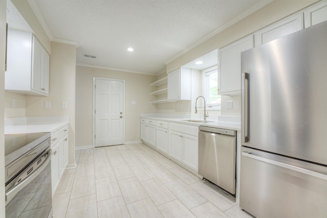 1823 Allenby Green Dr Unit 6, Germantown, TN 38139 - kitchen featuring appliances with stainless steel finishes, a sink, crown molding, open shelves, and light countertops
