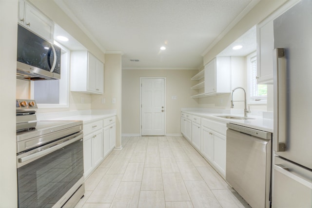 1823 Allenby Green Dr Unit 6, Germantown, TN 38139 - kitchen with appliances with stainless steel finishes, a sink, open shelves, light countertops, and white cabinetry