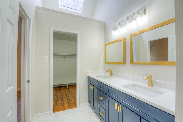 1823 Allenby Green Dr Unit 6, Germantown, TN 38139 - full bathroom with marble finish floors, double vanity, a walk in closet, and a skylight