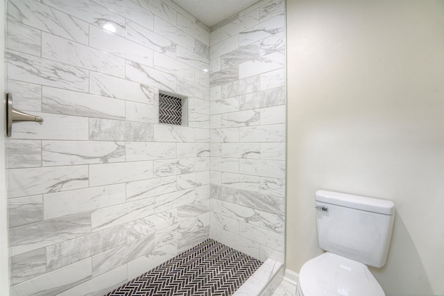 1823 Allenby Green Dr Unit 6, Germantown, TN 38139 - bathroom featuring toilet, a tile shower, and marble finish flooring