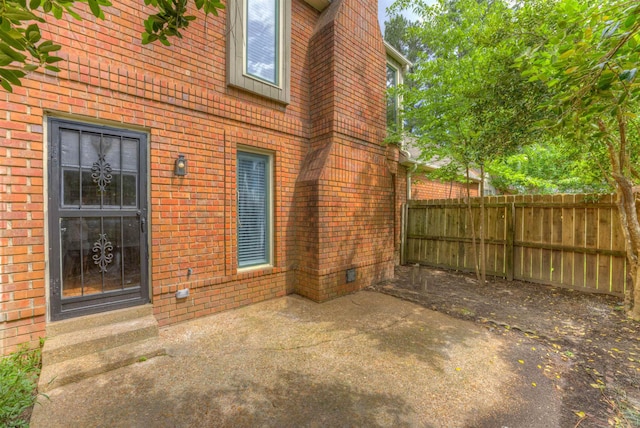 1823 Allenby Green Dr Unit 6, Germantown, TN 38139 - doorway to property featuring brick siding and a patio