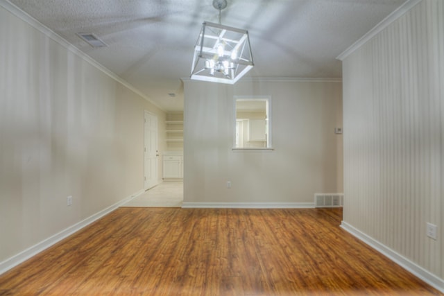 1823 Allenby Green Dr Unit 6, Germantown, TN 38139 - unfurnished room with wood finished floors, ornamental molding, a chandelier, and baseboards