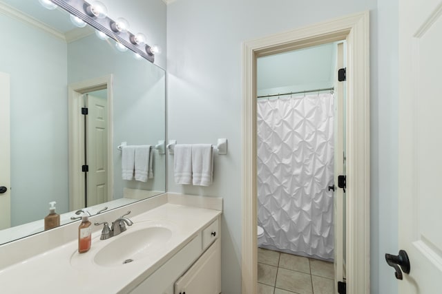 9245 Forest Estates Cv, Germantown, TN 38139 - bathroom with tile patterned floors, toilet, vanity, crown molding, and a shower with curtain
