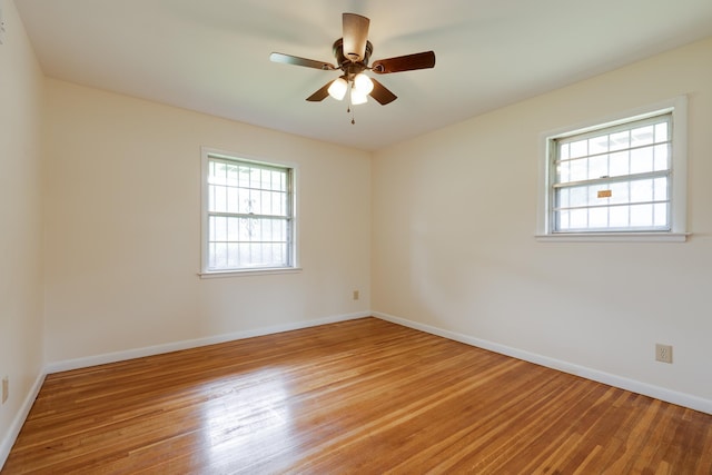 5151 Canton Dr, Memphis, TN 38116 - unfurnished room with light wood-style floors, baseboards, and a ceiling fan