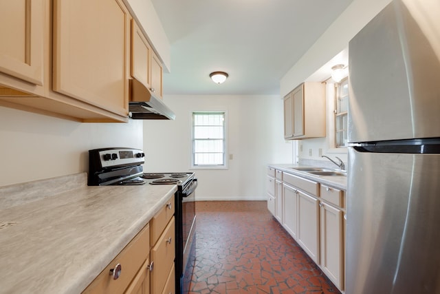 5151 Canton Dr, Memphis, TN 38116 - kitchen with freestanding refrigerator, electric range oven, under cabinet range hood, a sink, and light countertops