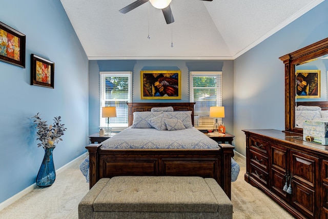 3120 Caledonia Rd, Memphis, TN 38119 - bedroom with light colored carpet, vaulted ceiling, multiple windows, baseboards, and a textured ceiling