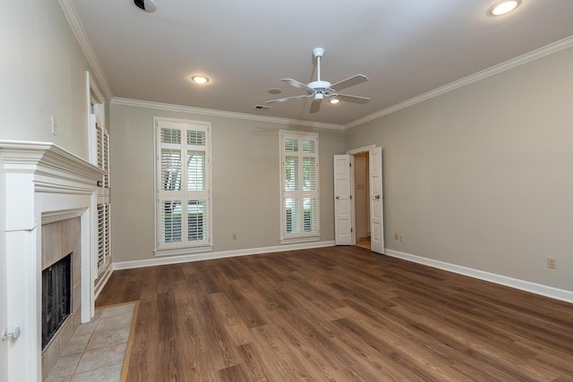 1060 Island Dr, Memphis, TN 38103 - unfurnished living room with a ceiling fan, wood finished floors, crown molding, a fireplace, and baseboards