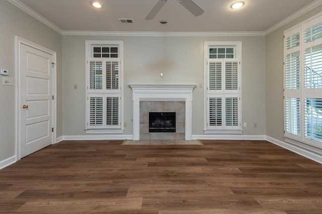 1060 Island Dr, Memphis, TN 38103 - unfurnished living room with crown molding, a ceiling fan, wood finished floors, baseboards, and a fireplace