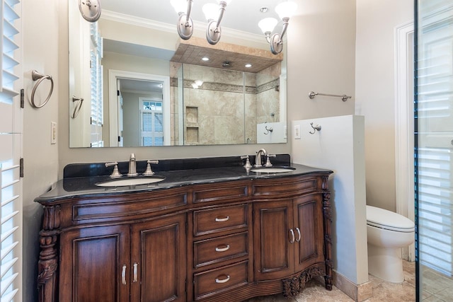 1060 Island Dr, Memphis, TN 38103 - bathroom featuring double vanity, toilet, ornamental molding, and a tile shower