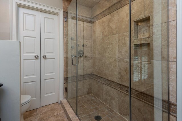 1060 Island Dr, Memphis, TN 38103 - full bathroom with a shower stall and toilet