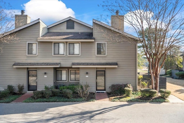 1829 Eagle Branch Cv Unit 41, Germantown, TN 38138 - view of front of home with a chimney and roof with shingles