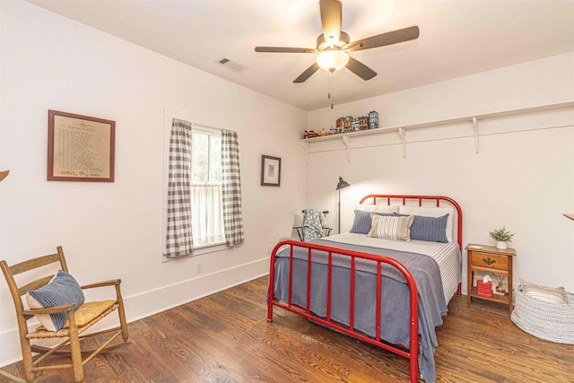 504 Rushing Rd, Michie, TN 38357 - bedroom featuring wood finished floors, baseboards, and a ceiling fan