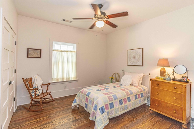 504 Rushing Rd, Michie, TN 38357 - bedroom with wood finished floors, baseboards, and a ceiling fan