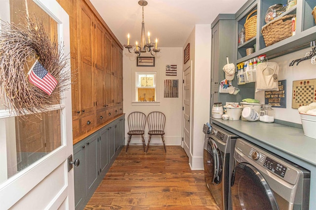504 Rushing Rd, Michie, TN 38357 - washroom with washing machine and clothes dryer, dark wood-style flooring, a chandelier, and baseboards