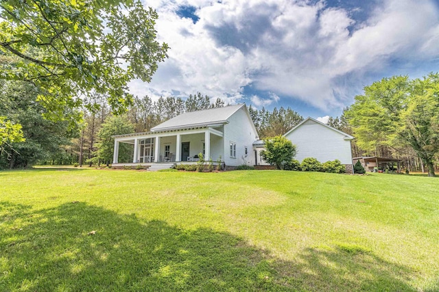 504 Rushing Rd, Michie, TN 38357 - view of front of property with covered porch and a front yard