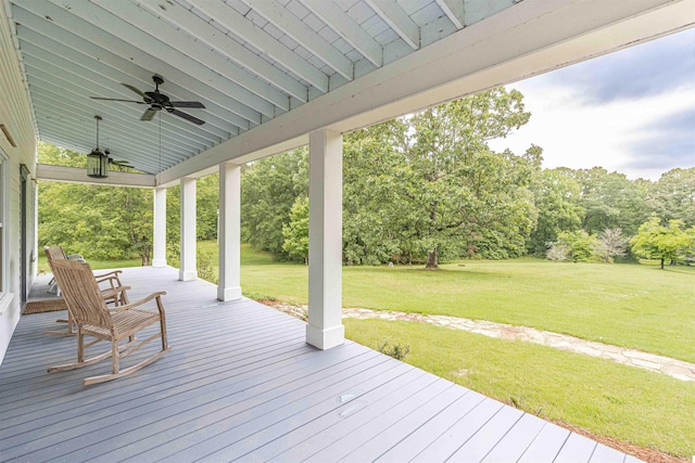 504 Rushing Rd, Michie, TN 38357 - wooden porch with ceiling fan and a yard